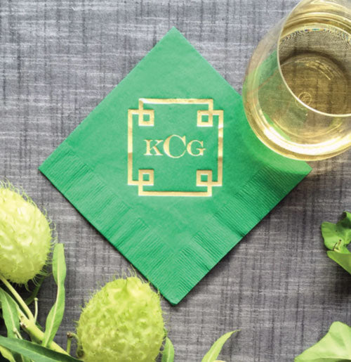 Emerald color cocktail napkins printed with gold foil.